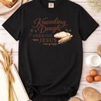 Christian Baking T-Shirt — "Kneading Dough and Needing Jesus"